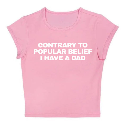contrary to popular belief pink baby tee