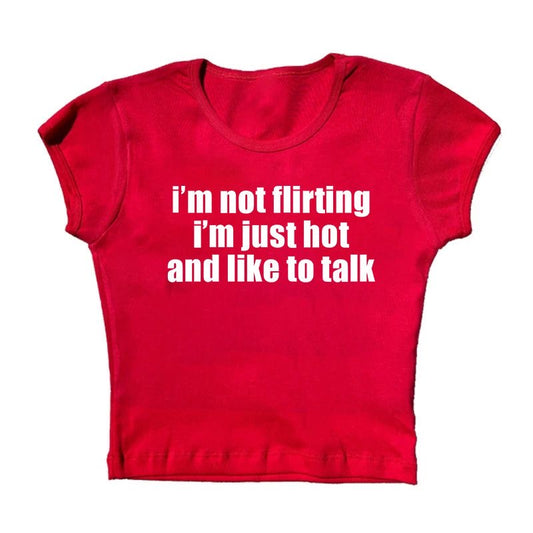 i’m not flirting i’m just hot and like to talk baby tee
